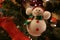 Jolly snowman ornament on a Christmas Tree