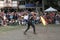 A jongleur performs a dance with burning in flames whips at the annual Bristol Renaissance Faire on September 4, 2010 in Kenosha,