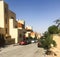 Jordan. Aqaba Residential quarter. Cars are parked along the street.