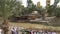 Jordan River, Israel - November 2019: Yardenit Baptismal Site. Christian pilgrims during mass baptism ceremony at Jordan