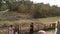 Jordan River, Israel - November 2019: Yardenit Baptismal Site. Christian pilgrims during mass baptism ceremony at Jordan River in