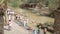 Jordan River, Israel - November 2019: Yardenit Baptismal Site. Christian pilgrims during mass baptism ceremony at Jordan River in