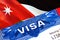 Jordan Visa in passport. USA immigration Visa for Jordan citizens focusing on word VISA. Travel Jordan visa in national