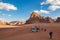 Jordan, Wadi Rum desert, people and cars on safari