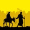 Joseph and Mary are on a donkey. Christmas scene.