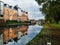 `Joules Court` retirement house and its reflection in Trent and Mersey Canal in town called Stone