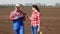 The journalist interviews the farmer for TV news report about Modern Agriculturally cultivation. background of newly