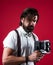 Journalist with vintage photo camera. formal party reporter. old fashioned bearded hipster. retro man in suspenders and