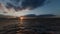 Journey to the sun before sunset over the raging ocean, 3D view