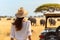 Journey through the Wild: Woman and Jeep Encounter Elephants, travel in Africa