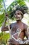 JOW VILLAGE, ASMAT PROVINCE, IRIAN JAYA, INDONESIA- JUNE 28: The Portrait Asmat warrior with a spear. Traditional fighting paintin