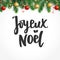 Joyeux noel text. Holiday greetings french quote. Fir tree branches and baubles. Great for Christmas cards, gift tags