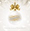 Joyeux noÃ«l. Hanging white Christmas bauble with glitter gold bow ribbon and greeting in French with flourishes elements.