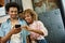 joyful african american couple looking at