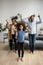 Joyful African American family recording funny dance.