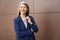 Joyful aged lady looking professional and positive in stylish suit