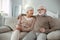 Joyful aged man hugging his wife