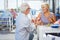 Joyful aged woman receiving the marriage proposal