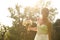 Joyful bride with beautiful bouquet