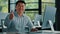 Joyful businessman asian mature chinese japanese man office manager work on computer make thumb up gesture good fine