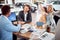 Joyful caucasian family buying a car together