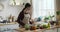 Joyful Caucasian Woman Cooking using Laptop