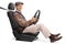 Joyful elderly man sitting on a car seat