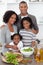 Joyful family preparing dinner