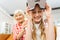 Joyful grandparent looking at her happy granddaughter