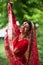 joyful indian bride in red sari