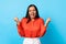 Joyful Indian Lady Shaking Fists Shouting In Joy, Blue Background