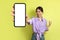 Joyful Japanese Lady Showing Huge Phone Gesturing Yes, Yellow Background