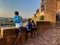 Joyful kids overlook Carcassonne castle at sunset enjoy panorama
