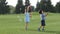 Joyful little asian kids playing with soap bubbles