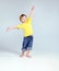 Joyful little boy playing a plane