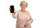 Joyful mature lady showing a phone