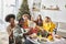 joyful multiracial family members taking selfie