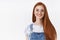 Joyful outgoing attractive redhead european girl long red hairstyle wear glasses smiling cheerful, listen lively