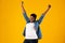 Joyful Oversized African Woman Posing With Raised Hands, Yellow Background