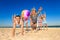 Joyful people playing volleyball