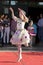 Joyful Performance: Young Small Ballerina Radiates Happiness on the Public Stage for World Dancing Day
