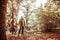 Joyful senior couple walking in a park.