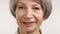 Joyful Senior Lady with Elegant Grey Hair Close-Up