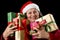 Joyful Senior Woman Hugging Eight Wrapped Gifts