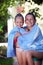 Joyful siblings wrapped in a towel after swimming