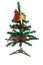 Joyful studio shot of a Christmas tree with colorful ornaments,