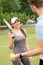 Joyful tennis players talking on court