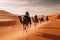 Joyful Tourist on Group Camel Ride in Desert