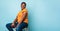 Joyful Vaccinated Black Woman Posing On Blue Background, Panorama