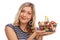 Joyful woman holding a shopping basket